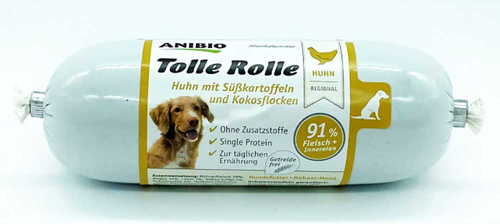 Verpackung der Anibio Tolle Rolle mit Huhn, Süßkartoffeln und Kokosflocken, Alleinfuttermittel für Hunde mit 91 % Fleisch und Innereien